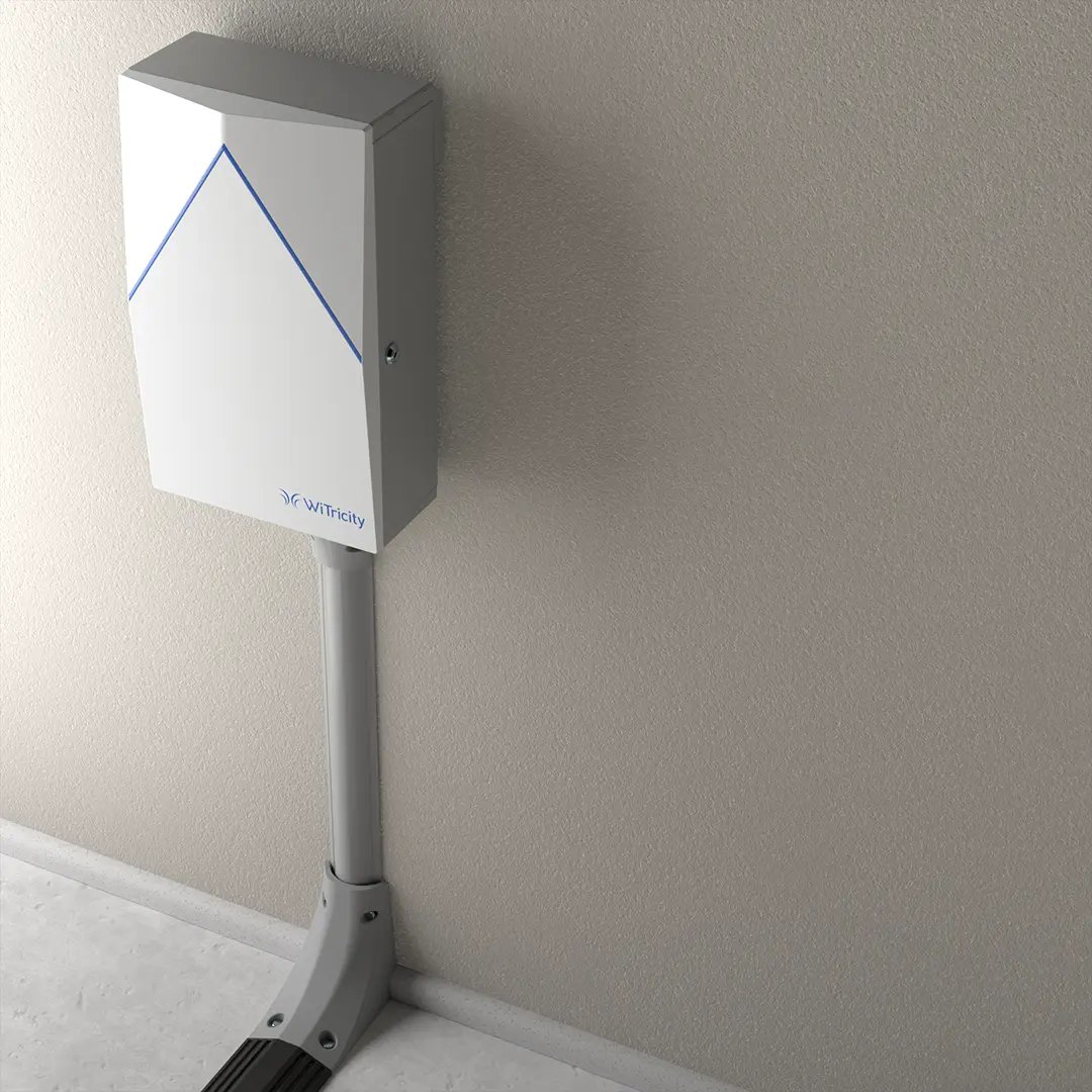 Detailed image of a WiTricity wireless charging wall box in a brightly lit garage