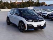 An electric black and white BMW