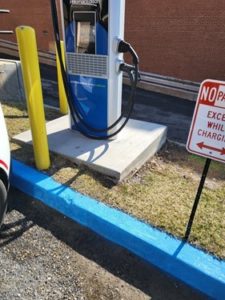 A wired EV charger that is not very accessible